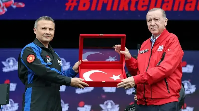 Erdogan unveils Turkey's first astronaut on election trail