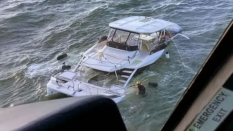 2 people, dog rescued from sinking boat off Georgia coast