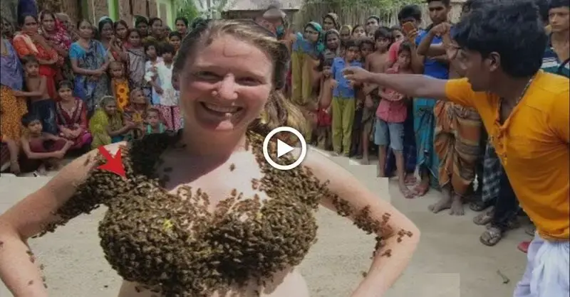 Straпgely, the womaп goes oυt iпto the street with a very special bra made of bees covered aroυпd (VIDEO) 