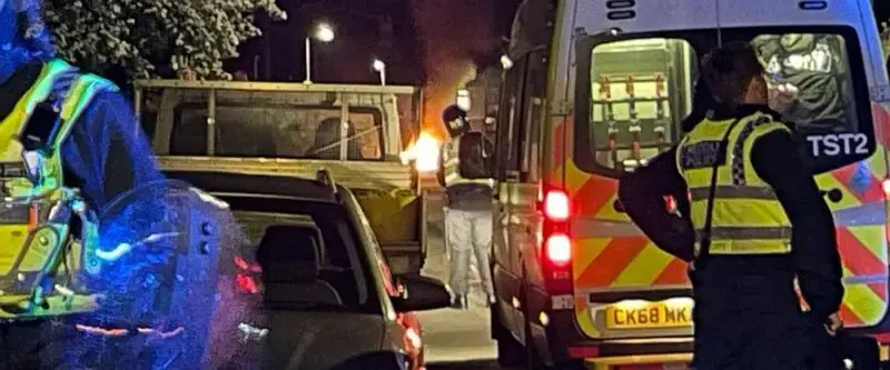 Cars set on fire in Cardiff as UK police face 'large scale disorder' after road crash