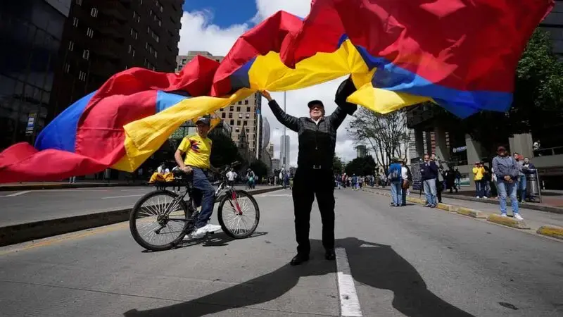 Thousands take to the streets in Colombia to protest leftist government's reforms