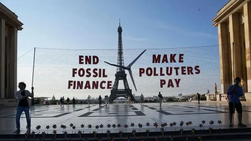 Leaders and activists are in Paris to seek a financial response to the climate emergency and poverty