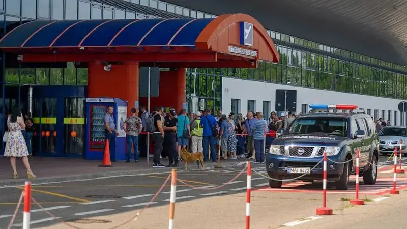 A Tajik man fatally shot two officers at Moldova's airport after he was denied entry, officials say