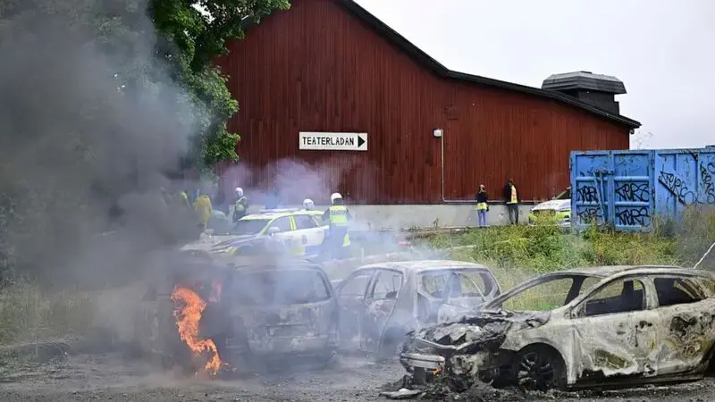 Protesters against Eritrea's government set fire to booths at cultural festival in Sweden