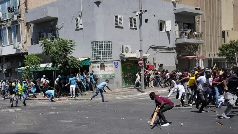 Rival Eritrean groups clash in Israel, leaving dozens hurt in worst confrontation in recent memory