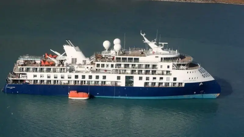A fishing vessel in Greenland will try to free a cruise ship that ran aground with 206 people