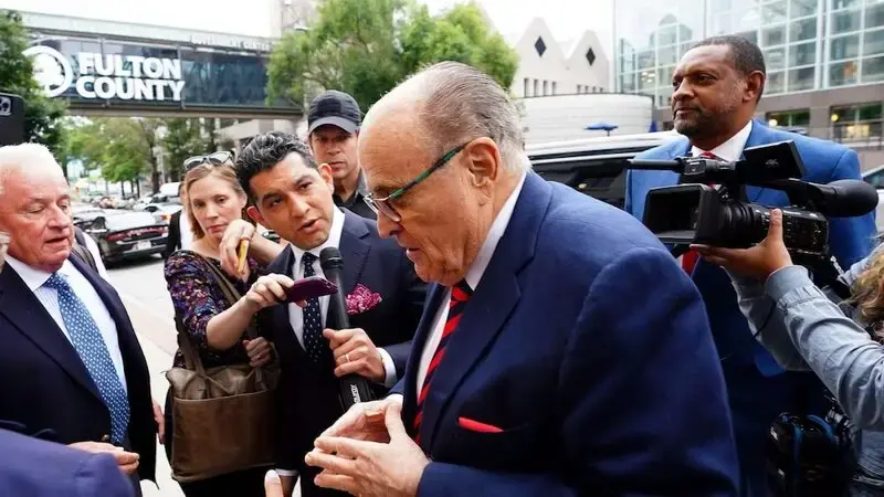Judge sets trial date to decide how much Giuliani owes 2 election workers for defaming them