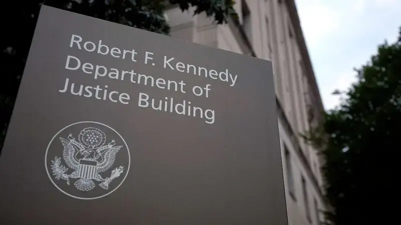 Justice Department arrests, charges IT contractor with espionage