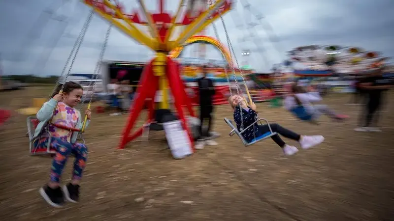 AP PHOTOS: Traditional autumn fair brings color and joy into everyday lives of Romania's poor