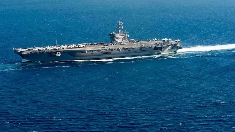 US moves carrier to Middle East following attacks on US forces