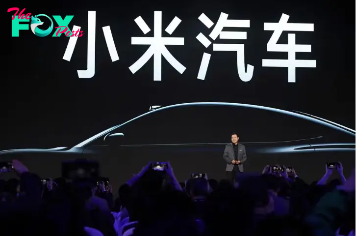 Xiaomi unveils first electric car, plans to become top automaker
