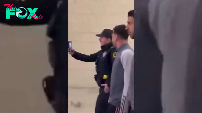 Watch: Messi’s bodyguard reacts to cop’s selfie