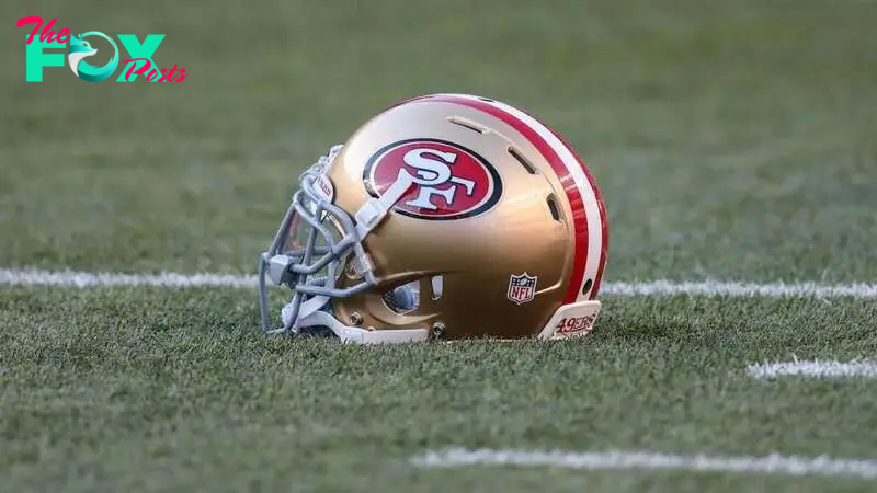 Why do the San Francisco 49ers wear red? What is the origin of their logo?