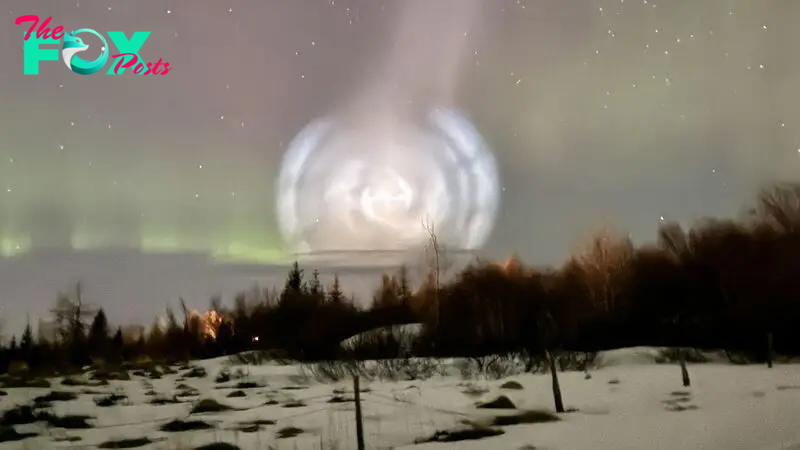 Dying SpaceX rocket creates glowing, galaxy-like spiral in the middle of the Northern Lights