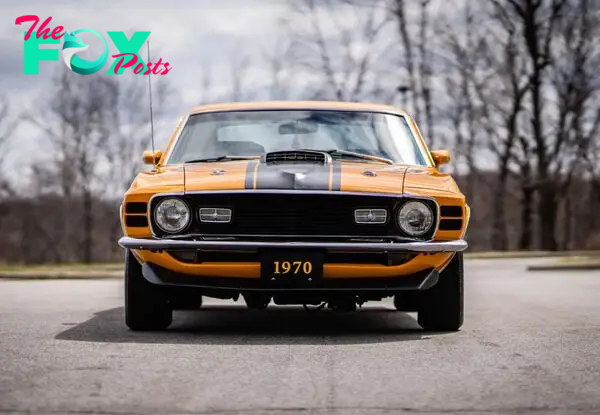 DQ “The Iconic 1970 Ford Mustang Mach 1: Reviving a Legend.”