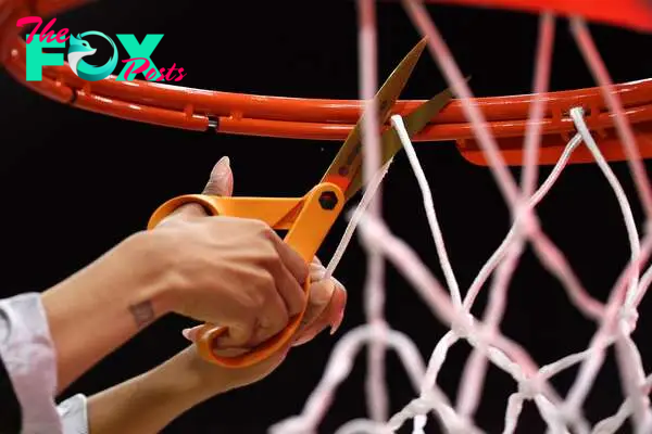 Why does the winning team cut the net of the basket? The NCAA tradition explained