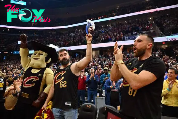 What diplomas have NFL brothers Travis and Jason Kelce been awarded?