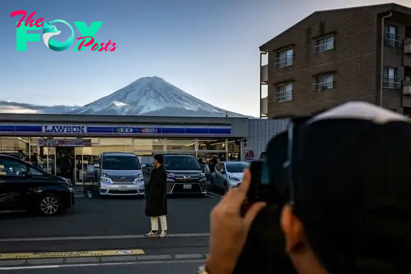 A Japanese Town, Frustrated by Overtourism, Is Blocking Its Instagram-Famous View of Mt. Fuji