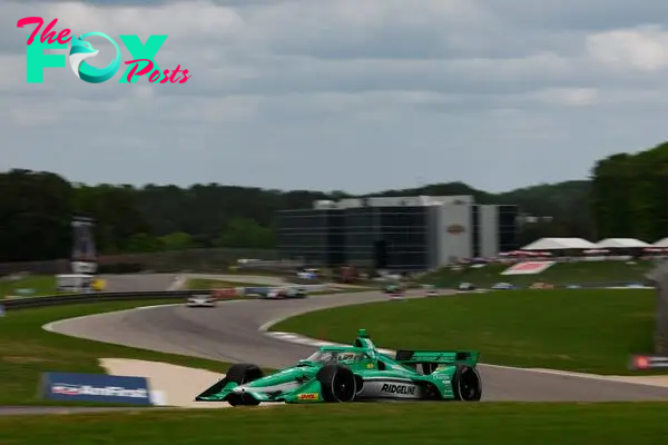 Mannequin Georgina hit after falling onto track during IndyCar race