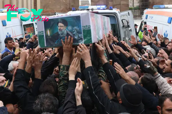 Thousands Attend Iranian President Raisi’s Funeral Procession, as Others Celebrate