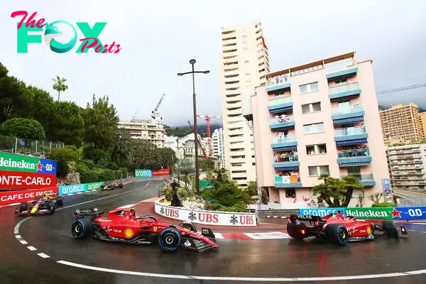 What F1 drivers have the most wins at the Monaco Grand Prix and who has the most pole positions?