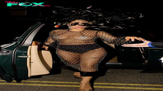 rin Lady Gaga in fishnets at her party in New York, but the attention is on her thong