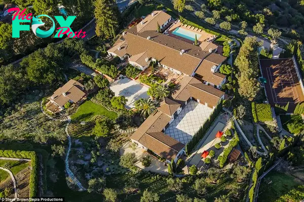 b83.Inside the $53 million California mansion designed by a Spanish royal architect: This opulent estate features a 50-foot deep tennis court that converts into a ballroom and includes a lavish 10,000 square foot Turkish bath.
