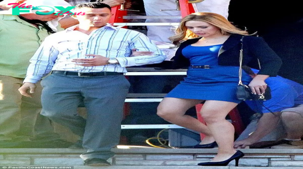 dq Don’t let go! A leggy Scarlett Johansson keeps a hold on Joseph Gordon-Levitt in high heels and a short dress on set