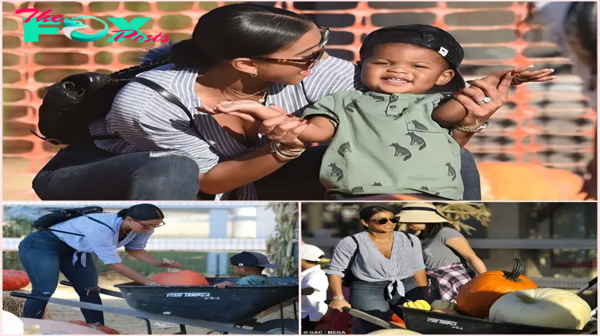 Eniko, Kevin Hart’s wife, spends a sunny Saturday at the pumpkin patch with their son Kenzo.