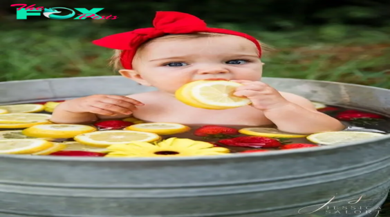 The cuteness of the children is captured through images of them bathing with delicious fruit.