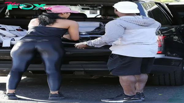 B83.Fans captured a heartwarming moment as Kevin Hart took his wife Eniko Parrish and their three children to lunch and ice cream in Los Angeles.