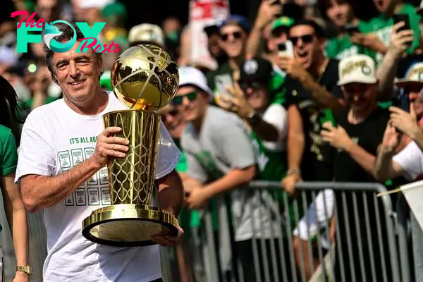 Why does Boston Celtics majority owner Wyc Grousbeck want to sell his stake in the franchise?