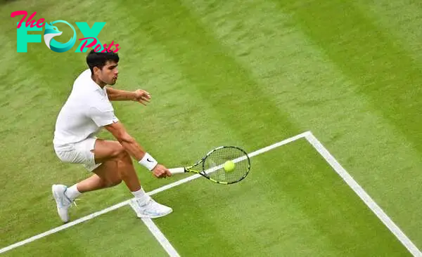 Why do they play on a grass surface at Wimbledon?