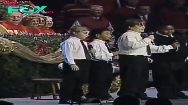 Four boys singing in church is the funniest thing I’ve seen: Keep your eyes on the boy in the vest