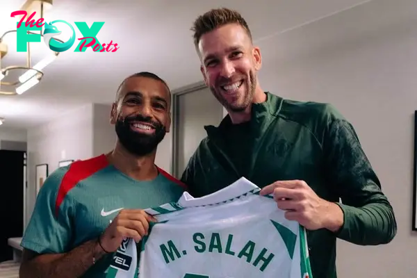 “I’m leaving!” – Mo Salah & Kostas Tsimikas given cheeky gifts on Liverpool reunion