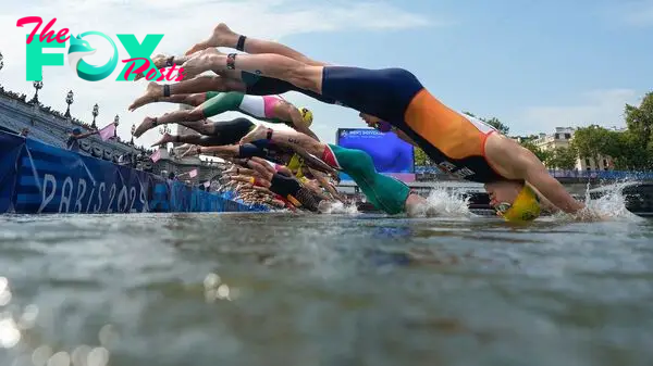 Olympic athletes dive into the Seine — days after it was deemed too contaminated with poop for safe swimming