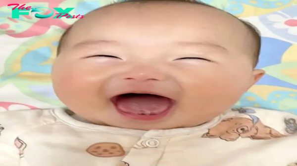 Heartwarming moment: A baby’s laughter brings joy to a mother’s soul.