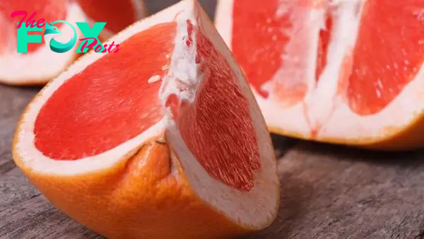 How does grapefruit interact with drugs?