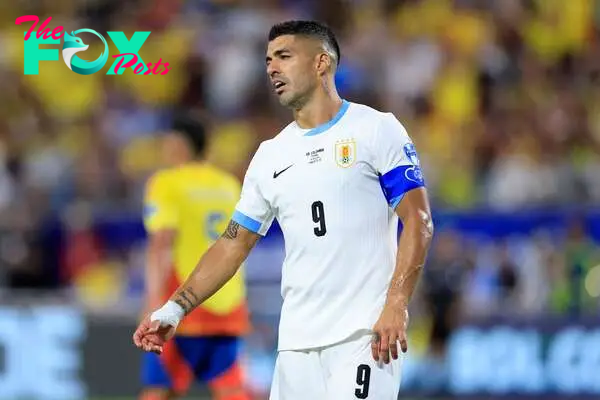 When is Uruguay striker Luis Suárez retiring from international soccer?