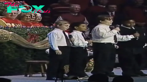 Four boys singing in church is the funniest thing I’ve seen. Keep your eyes on the boy in the vest