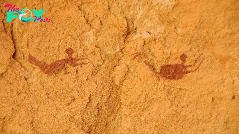 9,000-year-old rock art of people swimming in what's now the arid Sahara