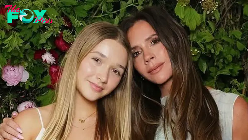 Harper Beckham mirrors her mum Victoria in a matching black top.Linh