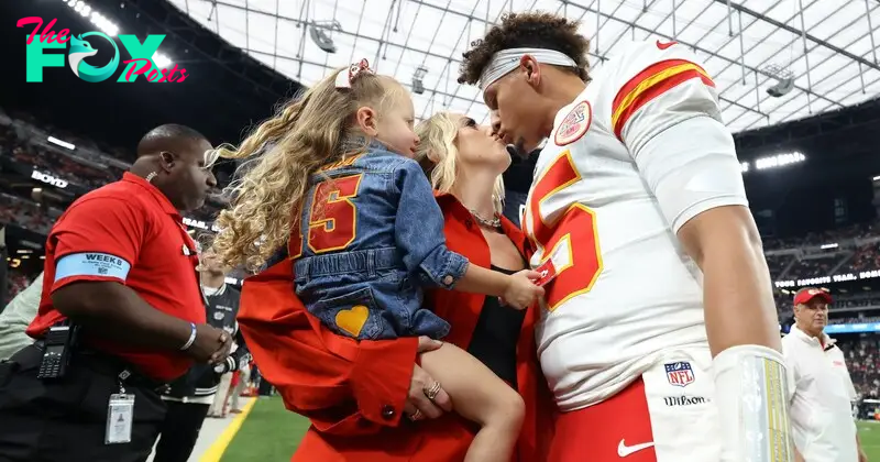 Pregnant Brittany Mahomes Is a Lady in Red in Chic Coat at Chiefs Away Game in Vegas